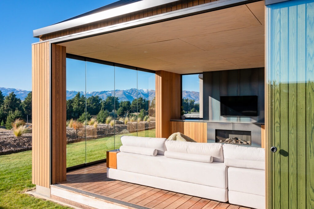 Frameless glass slider in Otago setting